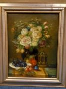 A signed Renaissance style oil on board, still life flowers and fruit, signed in a moulded frame.