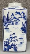 A large Chinese style blue and white square section porcelain vase. H.40cm