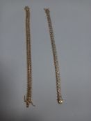 Two yellow metal tennis bracelets with China 925 marks to the clasps.