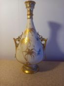 A 19th century Royal Worcester ivory blush and gilt vase with Oriental style hand painted