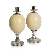 ANTHONY REDMILE: A PAIR OF OSTRICH EGG MOUNTED SILVER PLATE CANDLESTICKS, c.1970