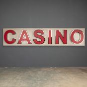 AN ILLUMINATING CASINO ADVERTISING SIGN c.1970