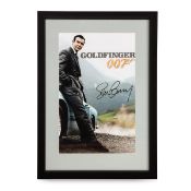 A JAMES BOND 007 SEAN CONNERY ASTON MARTIN DB5 FRAMED PHOTOGRAPH WITH SIGNATURE
