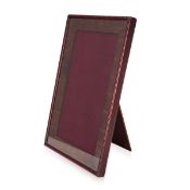 AN EARLY 20TH CENTURY BRITISH CROCODILE LEATHER PHOTO FRAME c.1920