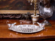 AN EDWARDIAN STERLING SILVER ASPARAGUS SERVING DISH, C. 1902