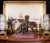 AUGUSTE JOSEPH PEIFFER (FRENCH, 1832-1886): A BRONZE MODEL OF A BOY WITH HOUND