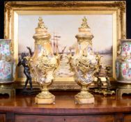A PAIR OF LATE 19TH / EARLY 20TH CENTURY SIENNA MARBLE AND ORMOLU MOUNTED URNS