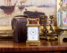 A LATE 19TH CENTURY FRENCH GILT BRASS AND PORCELAIN CARRIAGE CLOCK WITH REPEAT