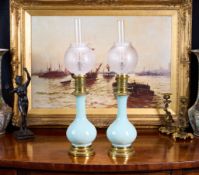 A PAIR OF 19TH CENTURY FRENCH CELADON PORECELAIN LAMP BASES