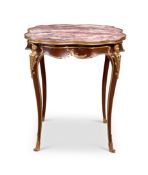 A FINE 19TH CENTURY ORMOLU MOUNTED GUERIDON IN THE MANNER OF FRANCOIS LINKE