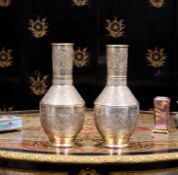 A PAIR OF SILVER ISLAMIC CALLIGRAPHIC VASES