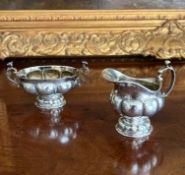 AN 18TH CENTURY CONTINENTAL SILVER CREAM JUG AND BOWL