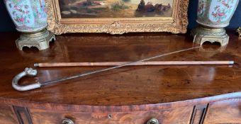 AN EARLY 20TH CENTURY GERMAN SWORD STICK WITH BULLDOG HANDLE