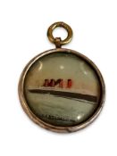 AN EARLY 20TH CENTURY MINIATURE ENAMELLED PENDANT DEPICTING RMS LUSITANIA