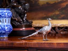 A LATE 19TH CENTURY GERMAN SILVER MODEL OF A PEACOCK
