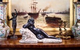 AFTER PRADIER (1790-1852): A FIGURE OF A NUDE 'FEMME SUR ROCHER'