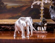 AN IMPRESSIVE STERLING SILVER ELEPHANT BY WILLIAM COMYNS & SONS LTD, LONDON, 1990