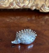 A SILVER PILL BOX MODELLED AS A HEDGEHOG