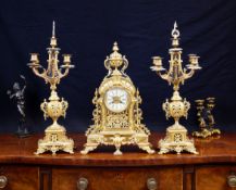A LARGE LATE 19TH CENTURY GILT BRONZE CLOCK GARNITURE