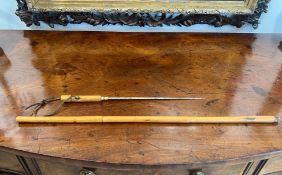 AN EARLY 20TH CENTURY BAMBOO SWORD STICK