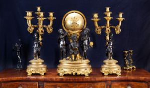 AN IMPRESSIVE 19TH CENTURY FRENCH GILT AND PATINATED BRONZE GLOBE CLOCK SET