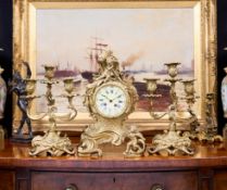 A LATE 19TH CENTURY FRENCH GILT BRONZE CLOCK GARNITURE