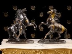 A MASSIVE PAIR OF 19TH CENTURY BRONZE MODELS OF THE MARLEY HORSES
