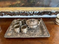 A PERSIAN SOLID SILVER TEA SERVICE IN THE GHAJARI STYLE