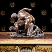 BARBEDIENNE: A 19TH CENTURY BRONZE GROUP OF 'THE WRESTLERS' AFTER THE ANTIQUE