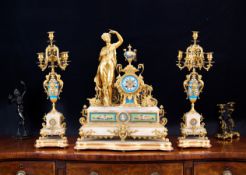 AN IMPRESSIVE 19TH CENTURY FRENCH PORCELAIN MOUNTED CLOCK GARNITURE