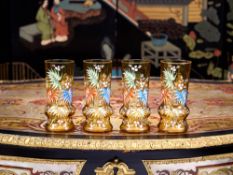 A SET OF FOUR ENAMELLED GLASS VASES
