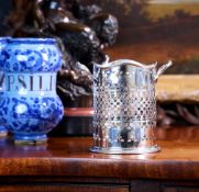 AN EARLY 20TH CENTURY STERLING SILVER CHAMPAGNE BOTTLE HOLDER C. 1913