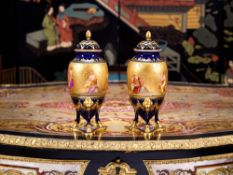 A PAIR OF 19TH CENTURY PORCELAIN POT POURRI VASES