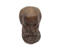 D. BRUCCIANI & CO.: A 19TH CENTURY PATINATED PLASTER DEATH MASK