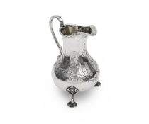A MID 19TH CENTURY STERLING SILVER CREAM JUG, LONDON, 1855