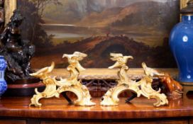 A PAIR OF MID 18TH CENTURY LOUIS XV ORMOLU CHENETS