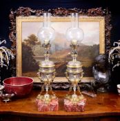 AN EXCEPTIONAL PAIR OF LATE 19TH CENTURY ORIENTALIST LAMP BASES MODELLED WITH CAMELS