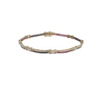 A 14K GOLD, RUBY DIAMOND AND SAPPHIRE BRACELET
