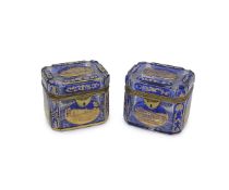 A NEAR PAIR OF 19TH CENTURY BOHEMIAN OVERLAY GLASS CASKETS IN THE STYLE OF MOSER