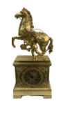 AN EARLY 19TH CENTURY FRENCH GILT BRONZE MANTEL CLOCK WITH MARLEY HORSE