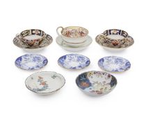 A COLLECTION OF 18TH AND 19TH CENTURY PORCELAIN CUPS AND SAUCERS