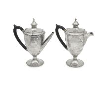 A PAIR OF 1920'S STERLING SILVER COFFEE AND HOT CHOCOLATE POTS