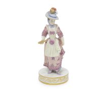 MEISSEN: A 19TH CENTURY PORCELAIN FIGURE OF A LADY CIRCA 1880