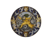 AN EARLY 17TH CENTURY MAIOLICA PLATE, DERUTA, DEPICTING BOREAS