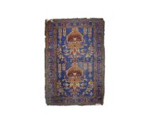 AN ANTIQUE AFGHAN BALOUCH RUG