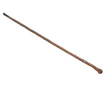 AN EALRY 20TH CENTURY ROOTWOOD, STEEL AND ENAMELLED SWORD STICK