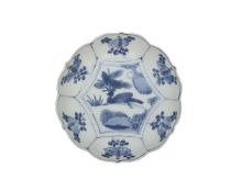 A LATE 16TH CENTURY CHINESE BLUE AND WHITE KRAAK PLATE