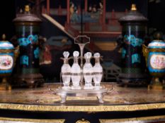 PAUL STORR: A GEORGE III SILVER AND GLASS CRUET SET, C. 1805