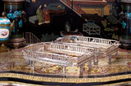 A LARGE PAIR OF PERSIAN SILVER PIERCED STANDS