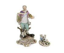 MEISSEN: A 19TH CENTURY MODEL OF A BOY AND GIRL TOGETHER WITH ANOTHER